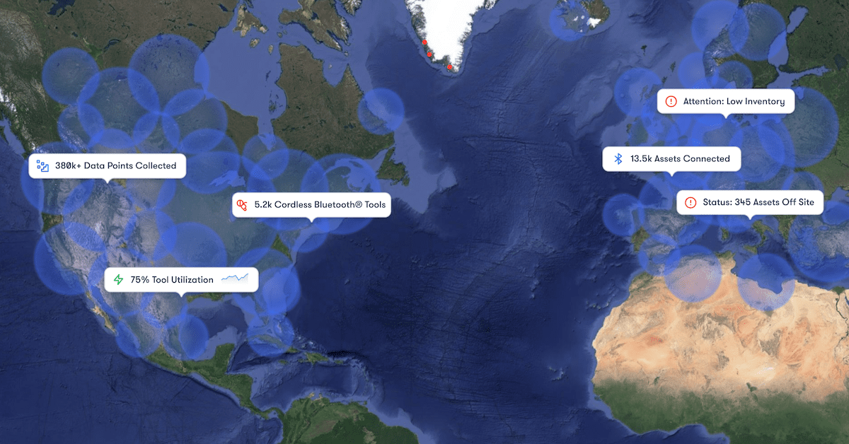 A world map with blue circles marking data points and stats on assets and utilization, highlighting construction equipment tracking.