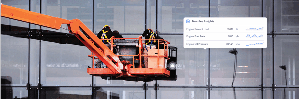 Two workers in safety gear use a cherry picker to inspect building glass as a digital overlay shows telematics machine data.