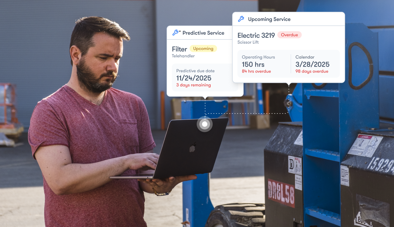 A man uses a laptop by industrial equipment with two service alerts overlaid, showing maintenance details for connected jobsite.