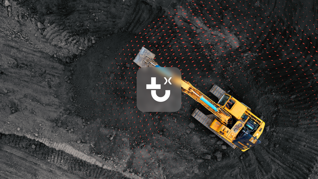 A yellow excavator at a construction site, seen from above with overlay icons and red dots, illustrating construction equipment tracking.