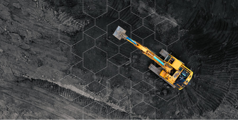 A yellow excavator works on dark soil from above, with a hexagonal pattern overlay hinting at construction IoT integration.