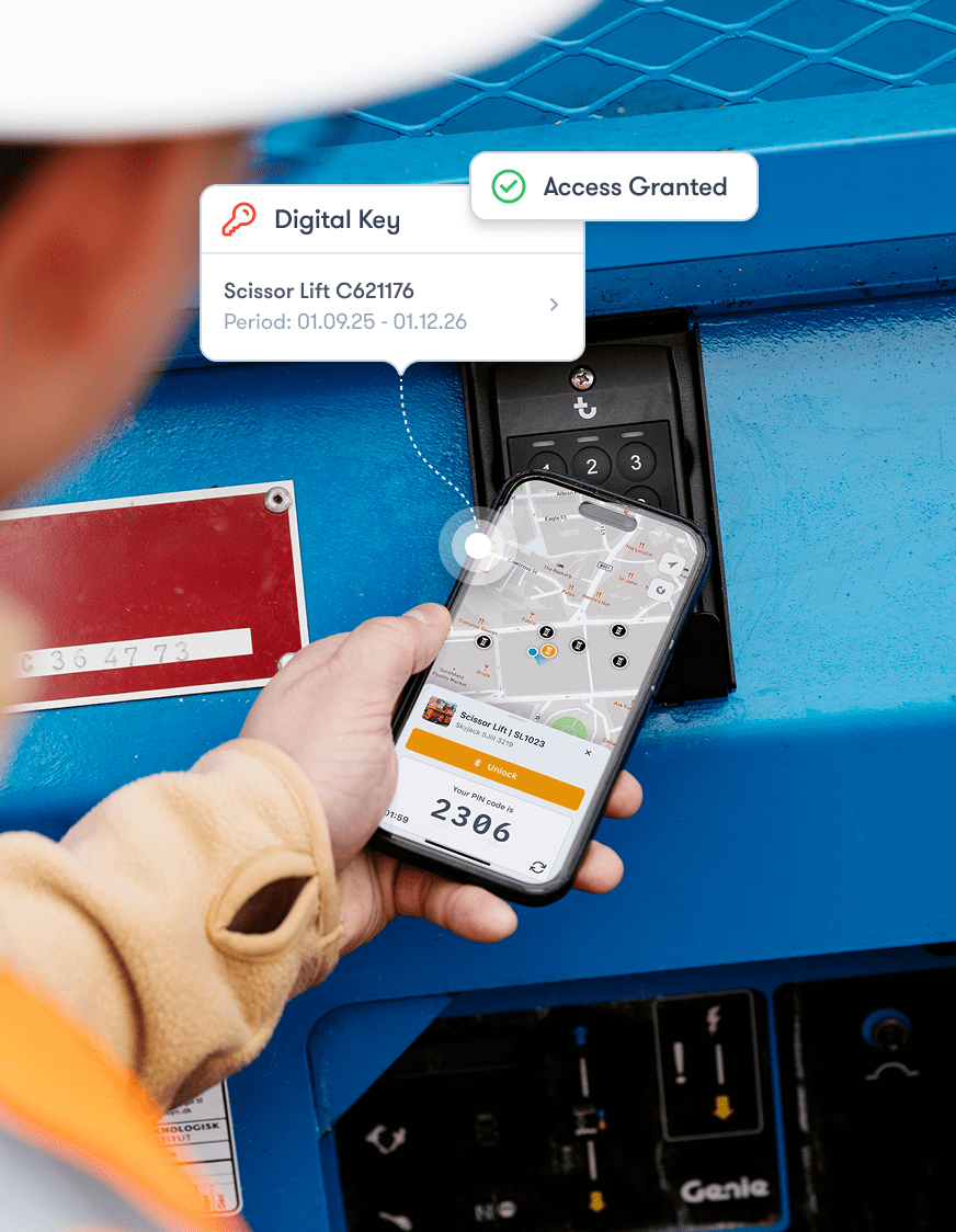 A person uses a smartphone showing digital key access and machine details for a scissor lift, highlighting connected jobsite.