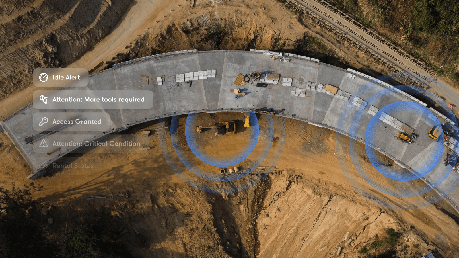 Aerial view of a curved bridge under construction with vehicles and workers, showing a connected jobsite and alert icons on the left.