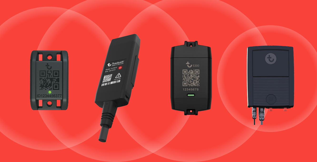 Four different Trackunit telematics devices for construction equipment tracking, arranged in a row against a red background with circular patterns.