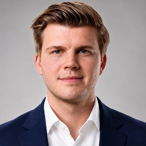 An IrisX man in a navy blue blazer and white collared shirt, representing fleet management.