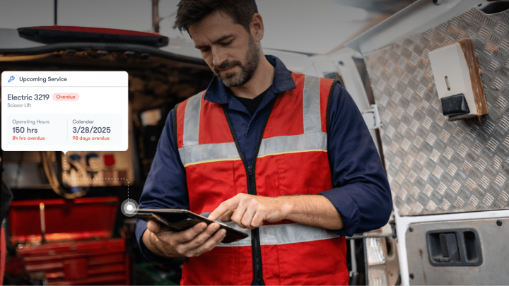 A male technician in a red safety vest uses a tablet by an open van; overlays show service details, hours, and calendar for fleet management.