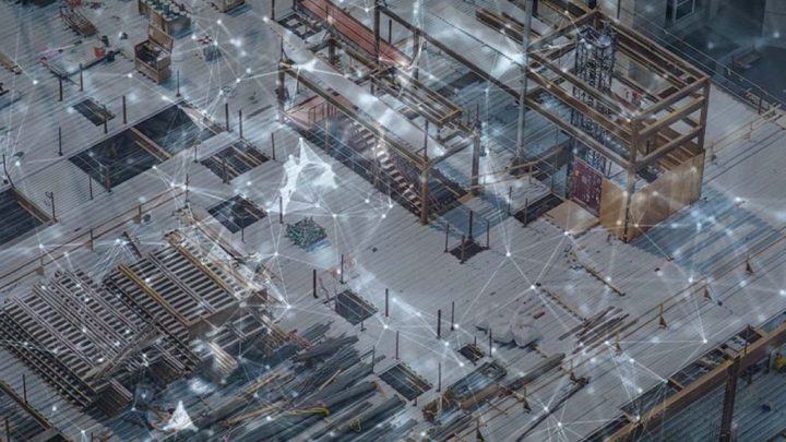A construction site with steel beams and equipment, overlaid by a digital network pattern symbolizing a connected jobsite.