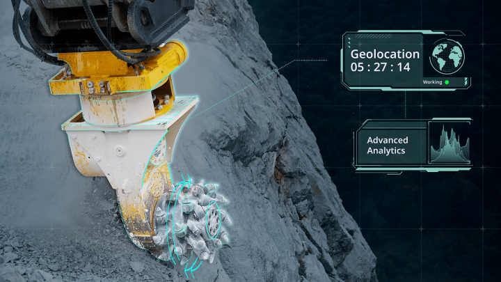 A large mining machine cuts rock on a steep slope with digital overlays showing real-time data, illustrating connected jobsite tech.