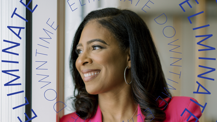 A woman in a bright pink blazer smiles by a window, with "ELIMINATE DOWNTIME" in blue text highlighting fleet management benefits.