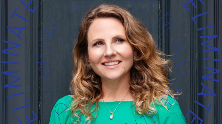 A smiling woman in a green top stands by a dark door with blue "ELIMINATE DOWNTIME" text, emphasizing connected jobsite.