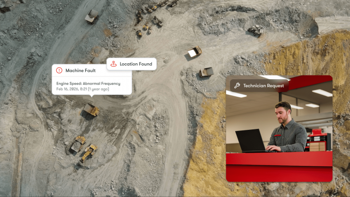Aerial view of a mining site with trucks and a machine fault alert; inset shows technician on laptop, highlighting connected jobsite.