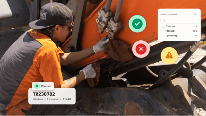 A worker in orange maintains a Liebherr excavator at Conexpo as on-screen graphics show service status; construction IoT context.