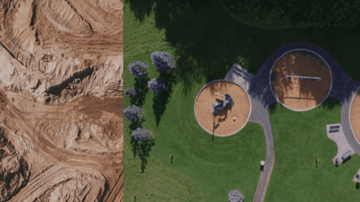Aerial view split: left shows barren land with Trackunit machinery for construction equipment tracking; right, a green park and playgrounds.